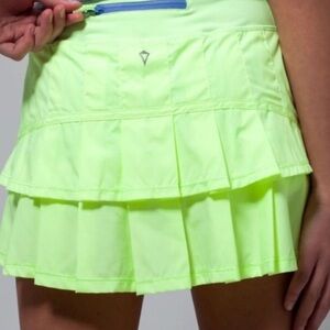 Ivivva lululemon Pace Ruffle Skirt girls 14 or extra small women/mark XS